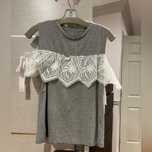 Beautiful grey with white top.